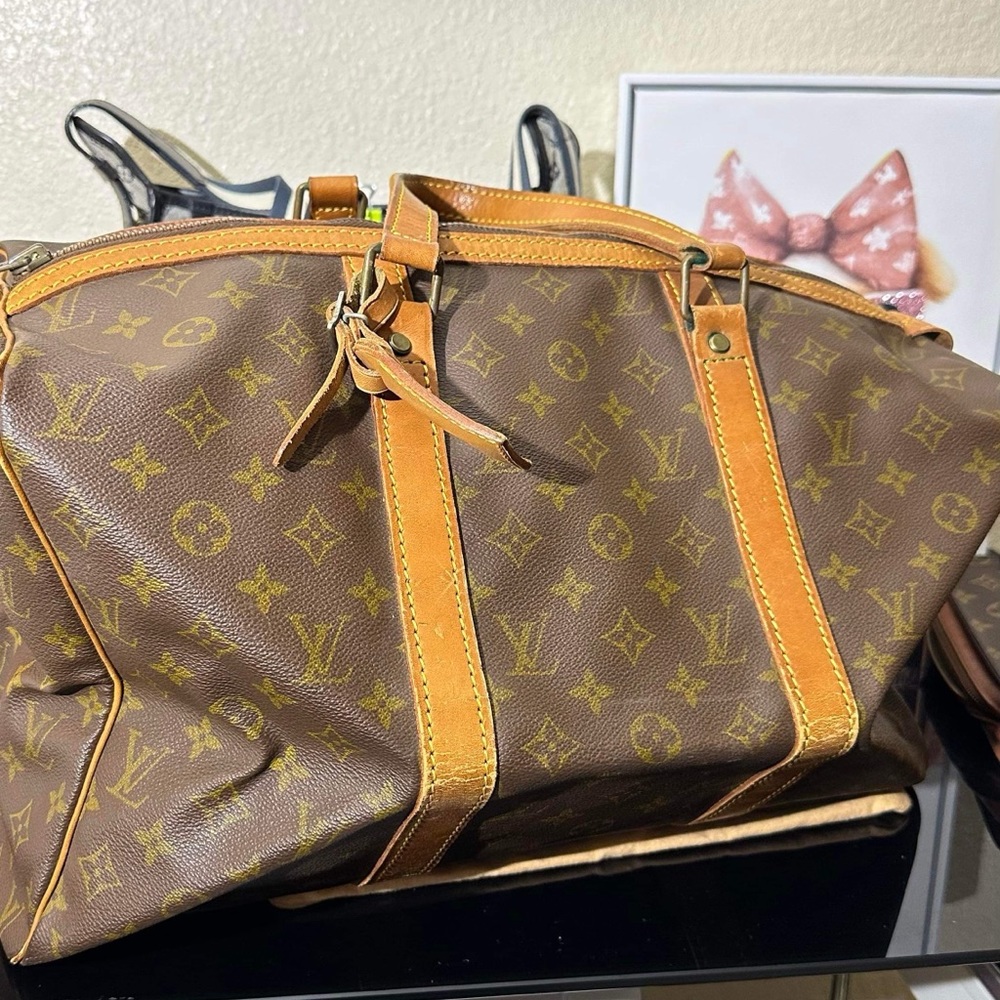 Louis Vuitton handbag/travel bag.